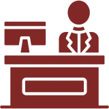 Person at desk with computer icon